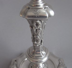 An important, and very unusual, set of four George II Rococo Cast Candlesticks made in London in 1740 by John Swift.
