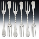 A very rare set of twelve George I tHREE pRONGED fORKS MADE IN eDINBURGH IN 1721 BY wILLIAM gED, aSSAY mASTER eDWARD pENMAN.