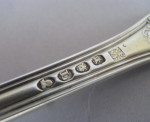 A very fine pair of George III Silver gilt Hourglass pattern sifter spoons made in London in 1806 by William Eley & William Fearn.