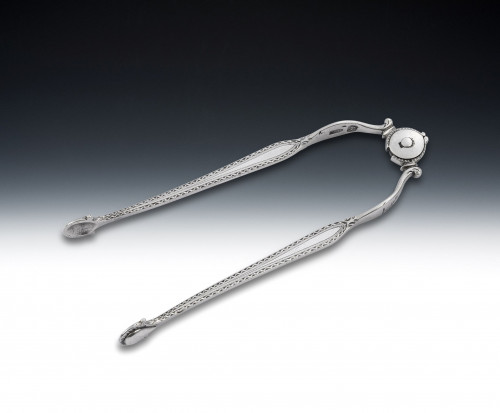 A fine pair of George III Sprung Suga Tongs made in London circa 1780 by William Cattell.