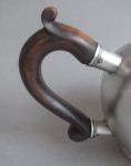 A very fine early George II Bullet Teapot made in London in 1731 by William Darker.