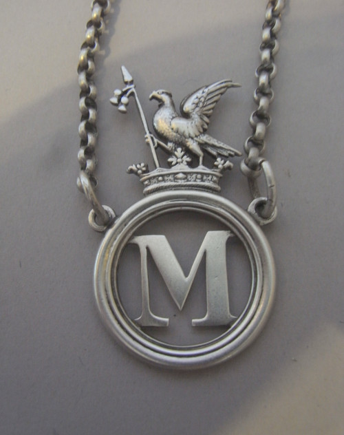 A very rare George IV Armorial Wine Label made in London in 1829 by Charles Reily & George Storer.