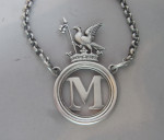 A very rare George IV Armorial Wine Label made in London in 1829 by Charles Reily & George Storer.