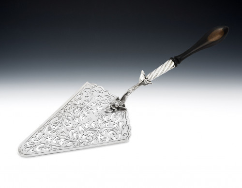 A very fine early George III "Dolphin" handled Serving Slice made in London in 1767 by William Plummer.