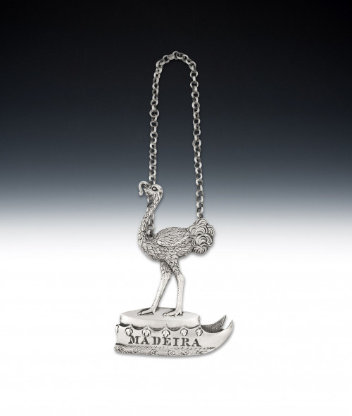 An important Cast Armorial Wine Label made most probably in London circa 1840 for the 1st Earl of Leicester at Holkham Hall, Norfolk.