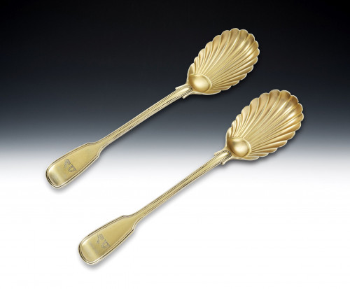 A fine pair of Silver Gilt Serving Spoons made in London in 1842 by George Adams.
