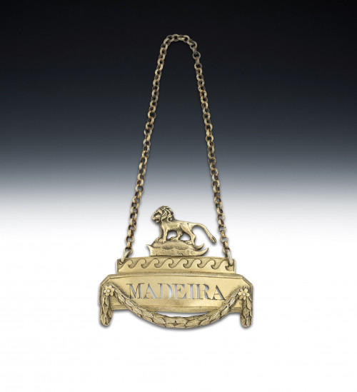 The Earl of Shrewsbury.  A very rare George III Silver Gilt cast Armorial Wine Label made in London in 1817 by John Reilly.