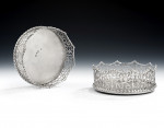 A very rare pair of George III silver based "Coronet" Wine Coasters made in London in 1770, maker's mark of T.L, in a serrated punch, see Grimwade mark 3845.