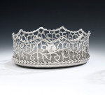 A very rare pair of George III silver based "Coronet" Wine Coasters made in London in 1770, maker's mark of T.L, in a serrated punch, see Grimwade mark 3845.