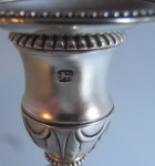 An exceptional pair of George III cast Candlesticks made in London in 1777 by Rpbert Makepeace & Richard Carter.