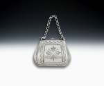 An attractive "Handbag" Vinaigrette made in Birmingham in 1887 by Hilliard & Thomason.