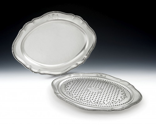 PAUL STORR - FROM THE COLLECTION OF THE 2ND BARON SHERBORNE.  An exceptional pair of large George III serving dishes, in sizes, one with a mazarin.  Made in london in 1820 by Paul Storr.