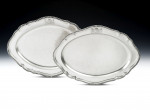 PAUL STORR - FROM THE COLLECTION OF THE 2ND BARON SHERBORNE.  An exceptional pair of large George III serving dishes, in sizes, one with a mazarin.  Made in london in 1820 by Paul Storr.