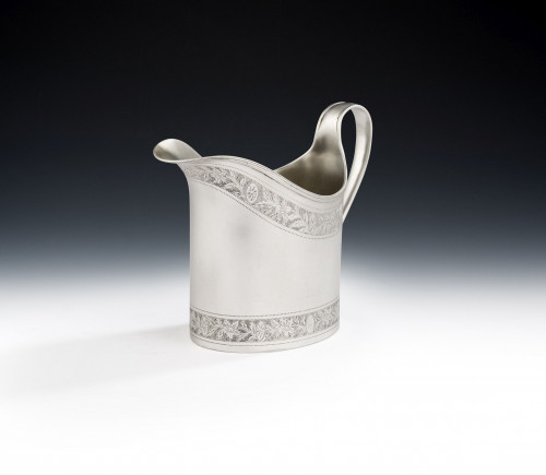 A very fine George III "Can" Shaped Milk Jug made in London in 1793 by Charles Chesterman II.