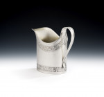 A very fine George III "Can" Shaped Milk Jug made in London in 1793 by Charles Chesterman II.