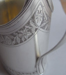 A very fine George III "Can" Shaped Milk Jug made in London in 1793 by Charles Chesterman II.