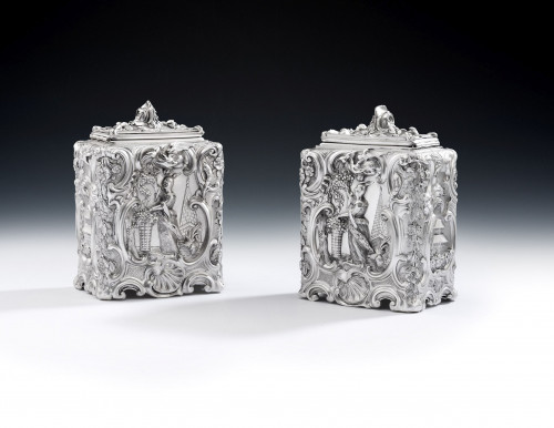 After Paul De Lamerie.  An exceptional, and very rare, pair of early George III Chinoiserie Tea Caddies made in London in 1761 by Thomas Pitts I.