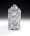 After Paul De Lamerie.  An exceptional, and very rare, pair of early George III Chinoiserie Tea Caddies made in London in 1761 by Thomas Pitts I.