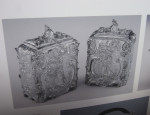 After Paul De Lamerie.  An exceptional, and very rare, pair of early George III Chinoiserie Tea Caddies made in London in 1761 by Thomas Pitts I.