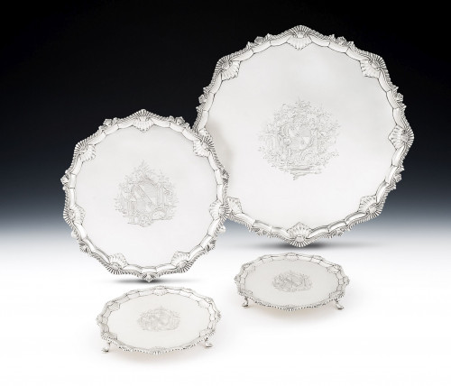 A rare early George III Suite of Salvers, in sizes, made in London in 1765 by John Crouch I & Thomas Hannam