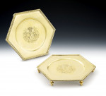 An important set of six Queen Anne Britannia Standard Silver Gilt Hexagonal Salvers.  Made in London in 1704 by David Willaume.