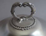 An important pair of silver divided warming dishes, and covers, from the collection of the 2nd Earl of Eldon.  Made in London in 1841 by Richard Sibley II.