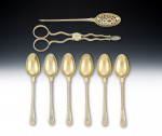 A very rare set of George II silver gilt Teaspoons together with their mote spoon and sugar nips.  All contained within their original case.  All made in London circa 1755.
