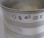 A fine George III "Barrel" Mug made in London in 1779 by John Edwards III & William Frisbee.  The maker's mark of Thomas Daniel overstriking, as retailer.