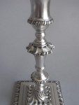 A very rare pair of early George III CAST Tapersticks made in London in 1766 by Ebenezer Coker.