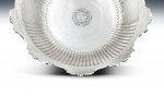 The Baron Guernsey Combination Monteith/Punch Bowl.  An important early Queen Anne Britannia Standard Combination Monteith/Punch Bowl made in London in 1703 by Isaac Dighton.