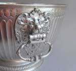 The Baron Guernsey Combination Monteith/Punch Bowl.  An important early Queen Anne Britannia Standard Combination Monteith/Punch Bowl made in London in 1703 by Isaac Dighton.