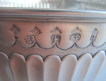 The Baron Guernsey Combination Monteith/Punch Bowl.  An important early Queen Anne Britannia Standard Combination Monteith/Punch Bowl made in London in 1703 by Isaac Dighton.
