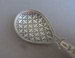 An unusual George III "Chequered" Caddy Spoon made in Birmingham in 1811 by Cocks & Bettridge.