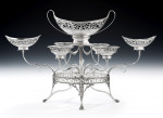 An outstanding George III Neo Classical Epergne made in London in 1784 by James Young.