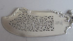 A very rare and exceptionally fine pair of fish servers, both made in London, the fish slice made by Theobald and Atkinson in 1838 and the Fork in 1889 by Aldwinkle & Slater,