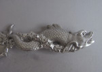 A very rare and exceptionally fine pair of fish servers, both made in London, the fish slice made by Theobald and Atkinson in 1838 and the Fork in 1889 by Aldwinkle & Slater,