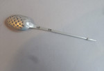 A very fine early George III Mote Spoon made in London circa 1765 by John Lampfert.