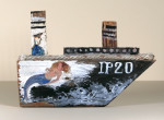 Painted driftwood model boat
