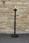 A Set Of four Large Floor Standing Candlesticks