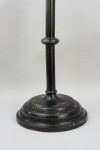 A Set Of four Large Floor Standing Candlesticks