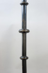 A Set Of four Large Floor Standing Candlesticks