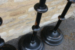 A Set Of four Large Floor Standing Candlesticks