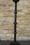 A Set Of four Large Floor Standing Candlesticks