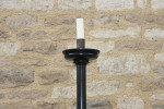 A Set Of four Large Floor Standing Candlesticks
