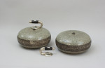 A Pair Of Engraved Curling Stones