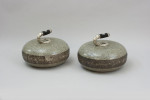A Pair Of Engraved Curling Stones