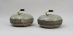 A Pair Of Engraved Curling Stones