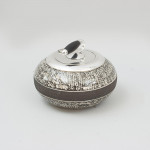 A Ceramic Curling Stone Shape Tobacco Jar Biscuit Barrel