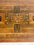 An eighteenth century Italian walnut marquetry table