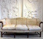 Geo lll mahogany camel back settee